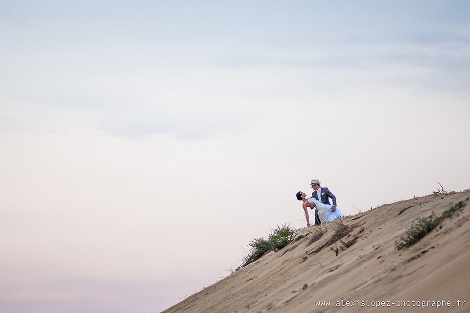 The picturesque bilingual wedding ceremony takes place against the backdrop of the great Pilat Dune
